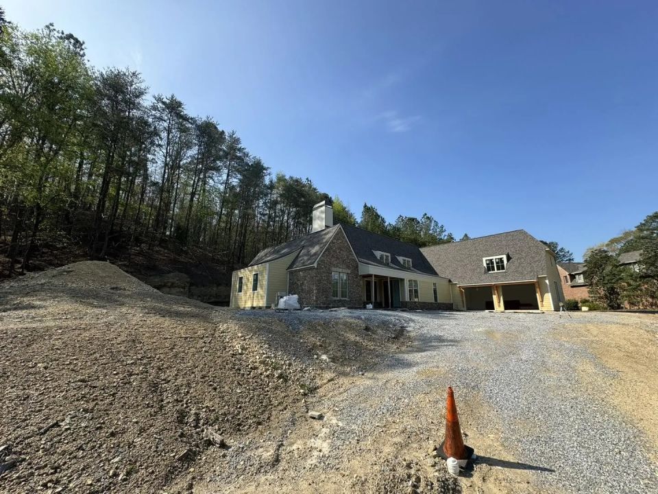 Back Fill And Final Grade On A Slab Home — photo 2