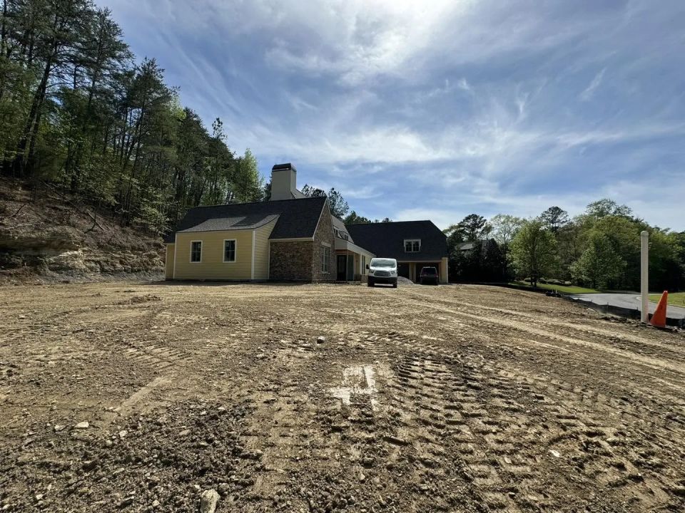 Back Fill And Final Grade On A Slab Home — photo 3