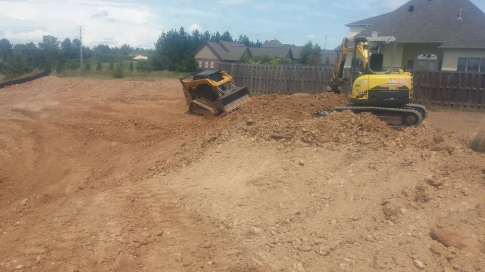Grading around a newly constructed house — photo 2