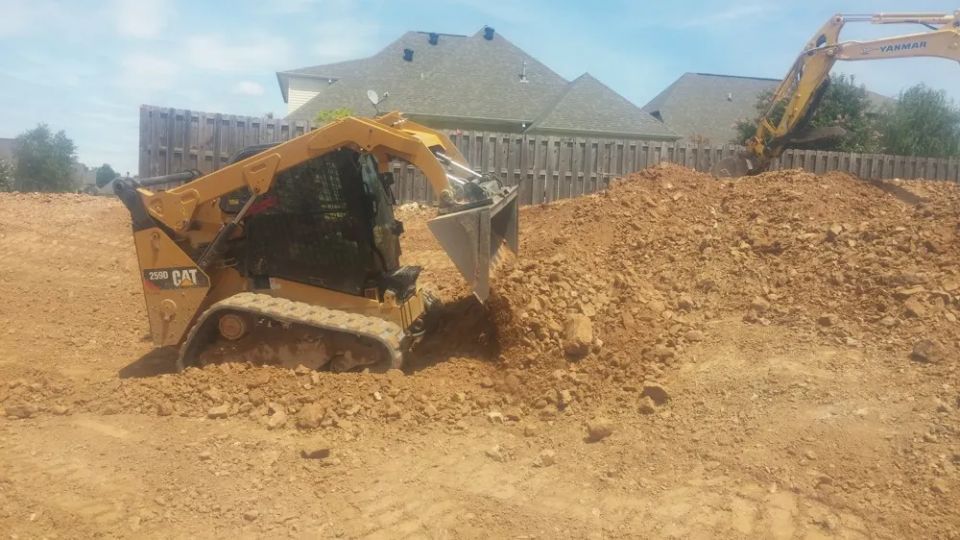 Grading around a newly constructed house — photo 5