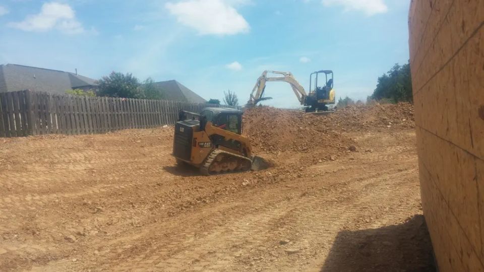 Grading around a newly constructed house — photo 7