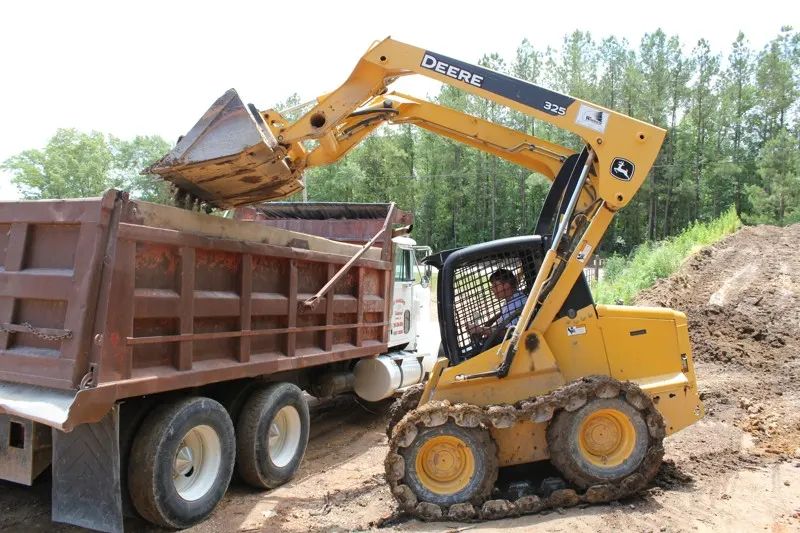 Top soil loading and delivery — photo 14