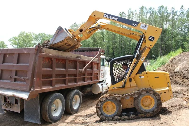 Top soil loading and delivery — photo 16