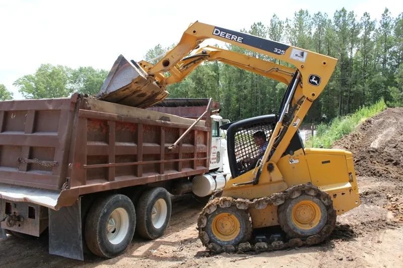 Top soil loading and delivery — photo 17